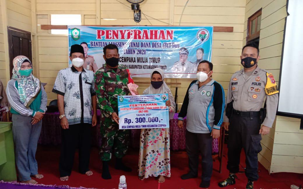 Penyaluran BLTD DD Tahap Tiga Dikawal TNI