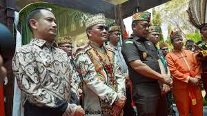 Prosesi Adat Dayak Warnai Kedatangan Pejabat Negara, Fokus pada Koperasi Desa Merah Putih